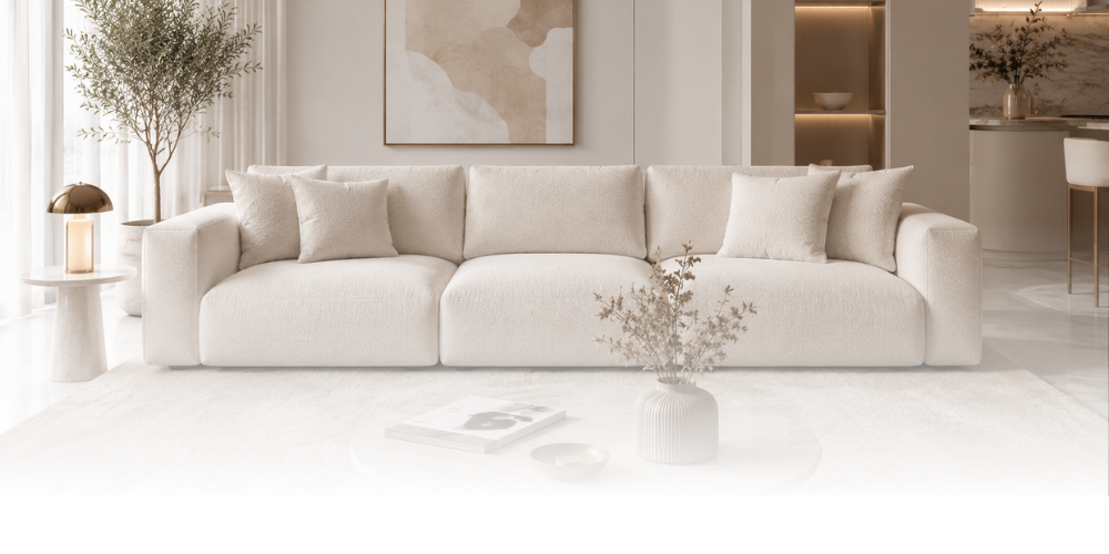 Nowoczesna sofa tapicerowana w eleganckiej aranżacji salonu